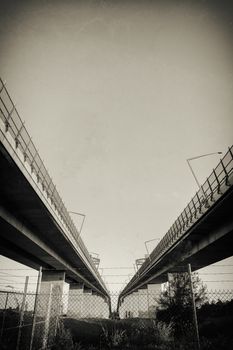 The Gateway Bridge (Sir Leo Hielscher Bridges) at sunset in Brisbane, Queensland, Australia. Abstract black and white image.