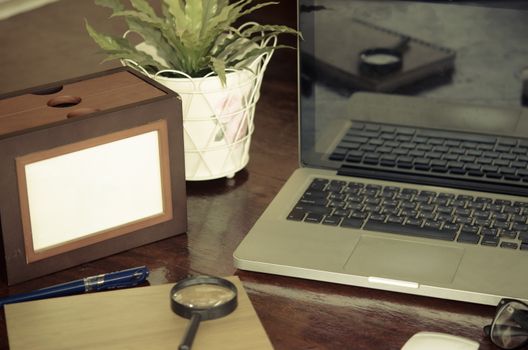 laptop on the desk - vintage effect style pictures