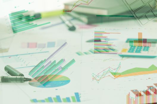 Financial paper charts and graphs on the table.style concept