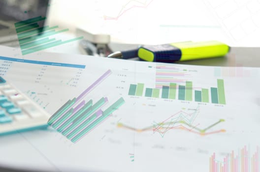 Graphs and charts, business table. The workplace of business people.