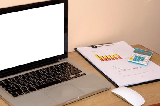 computer and document on the desk.