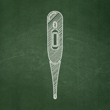 Medicine concept: Thermometer icon on Green chalkboard background