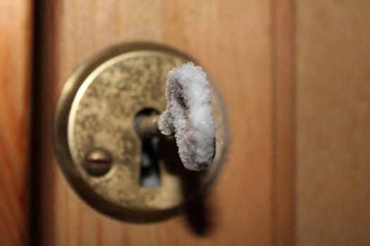 Inside door, With frosen key in the winter