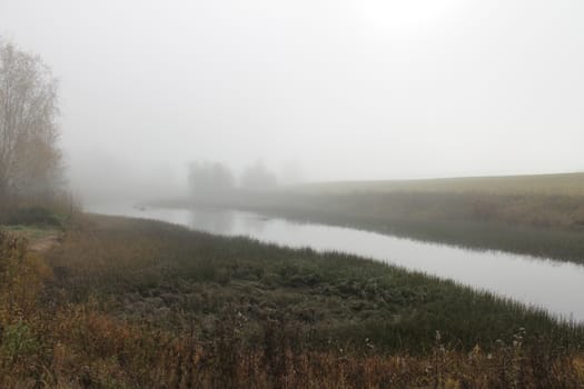 River in morning fog