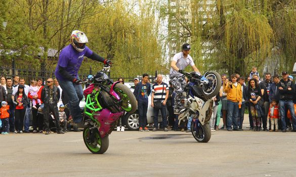 Moto free style pilot stunting on the square - Pyatigorsk, Russia, Opening of moto season 2015 on 1st May 2015
