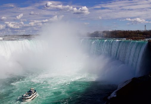 Beautiful photo of the Niagara falls and a ship