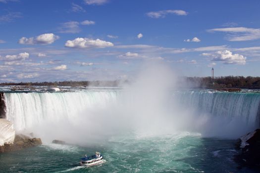 The ship in front of the mist of the beautiful Niagara falls