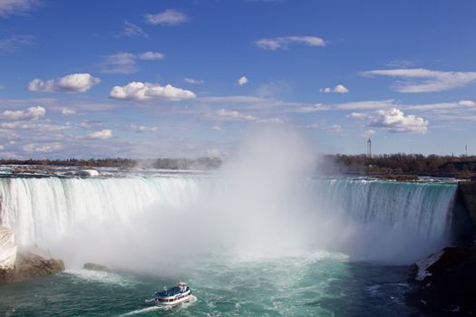 The photo of the entire Niagara falls and the ship