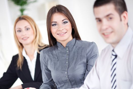 Happy young Businesswoman in the office, Looking at camera. Selective Focus.