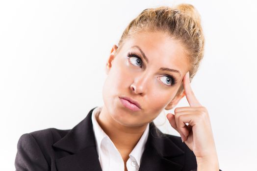 Portrait of attractive businesswoman thinking.
