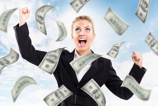 Happy Businesswoman under money rain.