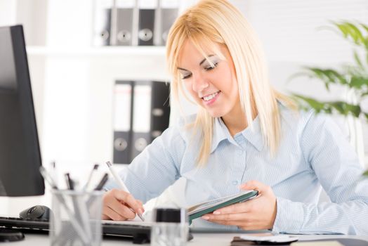 Beautiful Businesswoman working in the office.