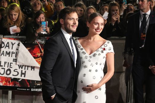 UNITED KINGDOM, London: Laura Haddock and Sam Claflin attend the UK premiere of The Hunger Games: Mockingjay - Part 2 at Odeon Leicester Square in London on November 5, 2015.