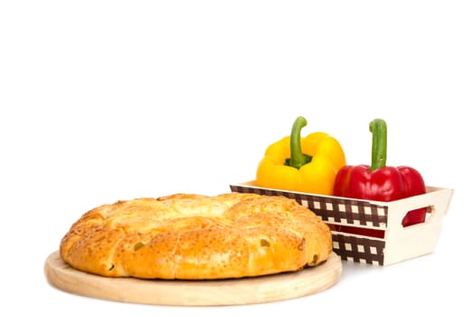 Composition with bread and vegetable  isolated on white .