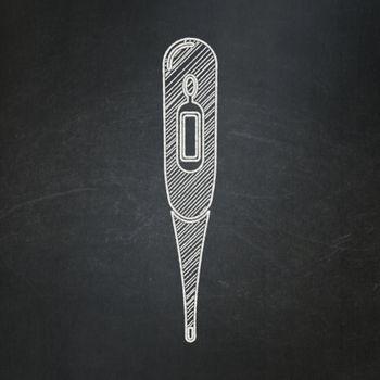 Health concept: Thermometer icon on Black chalkboard background