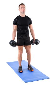 young man fitness instructor shows starting position of standing dumbbell dumbbell biceps curl, isolated on white