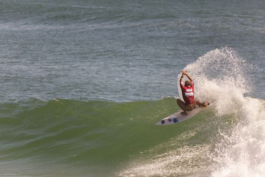 BREAKA BURLEIGH PRO 2013 , GOLD COAST, AUSTRALIA - FEB 3: Unidentified professional female surfer compete on the Burleigh Pro 2013 event, February 3, 2013, Burleigh , Gold Coast, Australia