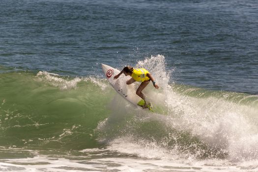 BREAKA BURLEIGH PRO 2013 , GOLD COAST, AUSTRALIA - FEB 3: Unidentified professional female surfer compete on the Burleigh Pro 2013 event, February 3, 2013, Burleigh , Gold Coast, Australia