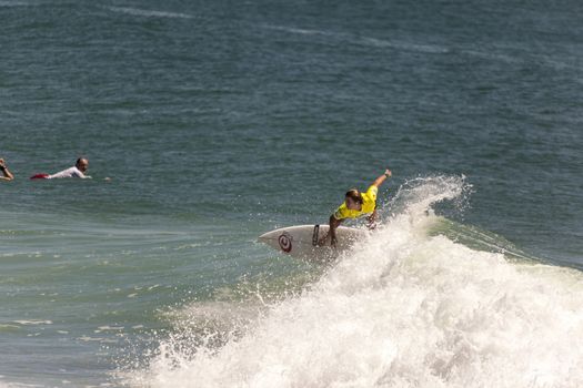 BREAKA BURLEIGH PRO 2013 , GOLD COAST, AUSTRALIA - FEB 3: Unidentified professional female surfer compete on the Burleigh Pro 2013 event, February 3, 2013, Burleigh , Gold Coast, Australia