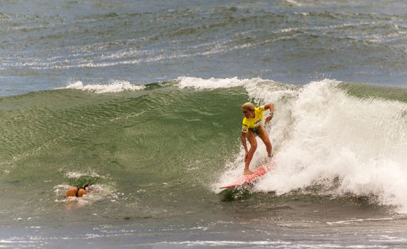 BREAKA BURLEIGH PRO 2013 , GOLD COAST, AUSTRALIA - FEB 3: Unidentified professional female surfer compete on the Burleigh Pro 2013 event, February 3, 2013, Burleigh , Gold Coast, Australia