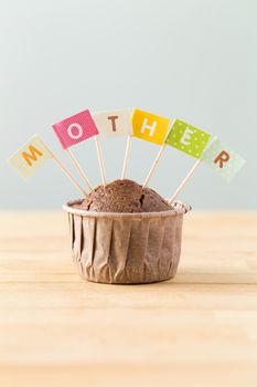 Flag on muffin with a word mother