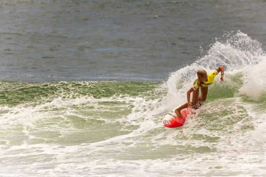 BREAKA BURLEIGH PRO 2013 , GOLD COAST, AUSTRALIA - FEB 3: Unidentified professional female surfer compete on the Burleigh Pro 2013 event, February 3, 2013, Burleigh , Gold Coast, Australia