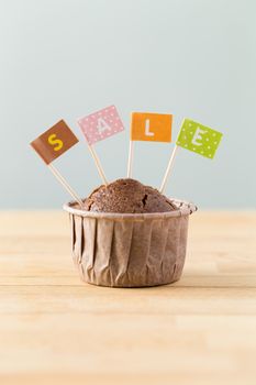 Flag on muffin with a word sale