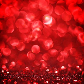 Abstract red shiny glitter bokeh christmas background