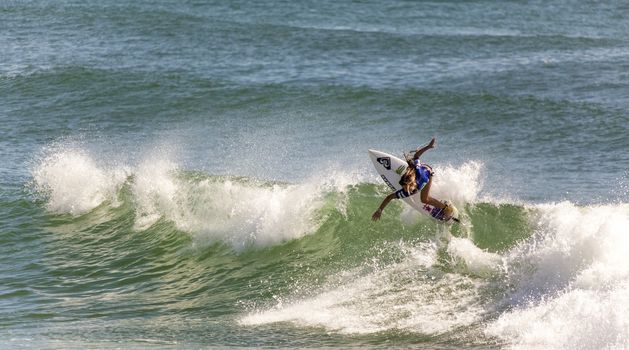 BREAKA BURLEIGH PRO 2013 , GOLD COAST, AUSTRALIA - FEB 3: Unidentified professional female surfer compete on the Burleigh Pro 2013 event, February 3, 2013, Burleigh , Gold Coast, Australia