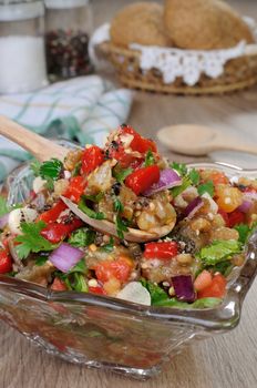 Salad of roasted eggplant with tomatoes, peppers, and cilantro