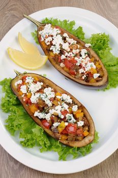 Stuffed eggplant with ricotta and vegetables in lettuce 