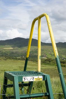 steps and handrail over a ditch for walkers on the kerry way in ireland