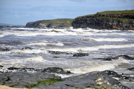 waves and cliffs on the wild atlantic way in Ballybunion county Kerry Ireland