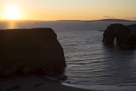beautiful sunset over the nuns beach and virgin rock on the wild atlantic way