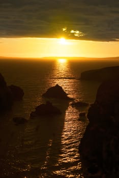 wild atlantic way sunset on the coastline of ballybunion county kerry ireland with wild grass in foreground