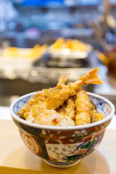 Tempura served over a bowl of rice