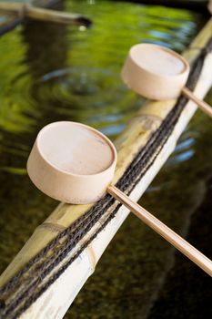 Purification fountain at entrance to Shinto Shrine