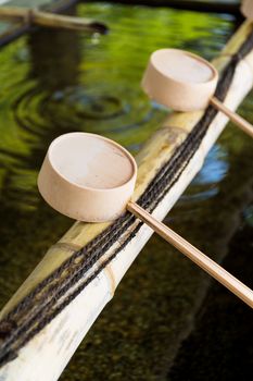 Traditional Japanese bamboo fountain dripping water