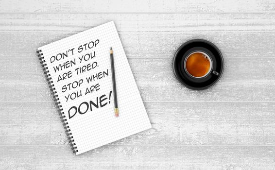 Inspirational quote on notepad.
DON'T STOP WHEN YOU ARE TIRED. STOP WHEN YOU ARE DONE!