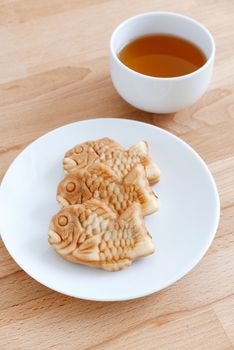 Taiyaki fish cake with cup of tea