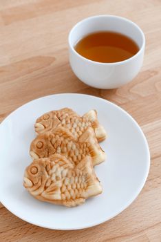 Japanese fish-shaped cake with a cup of tea