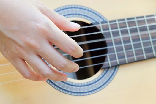Close up image of Man playing his guitar Background