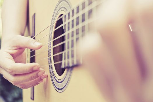 image of Man playing his acoustic guitar Background