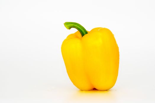 Yellow Sweet bell pepper (capsicum) isolated on white background