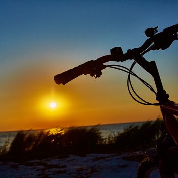 Bicycle at the beach on twilight time