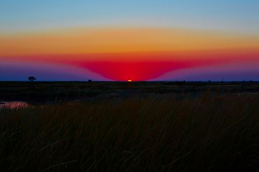 Scenic view of beautiful sunset in steppe 