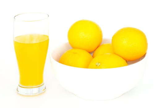 Orange fruit in white bowl on white background .