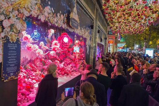 FRANCE, Paris: Crowd in front of Printemps Haussmann Christmas Decorations are pictured in Paris on November 6, 2015.
