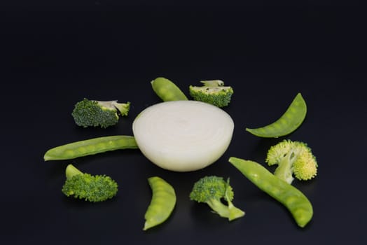 White Onion and vegetable isolated on back background