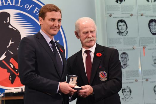 CANADA, Toronto: Sergei Federov is inducted into the Hockey Hall of Fame by Chairman Lanny McDonald on November 6, 2015.  Sergei Federov, Chris Pronger, Niklas Lidstrom, Phil Housley, Angela Ruggiero, Bill Hay and Peter Karamanos Jr. were the seven inductees honoured at the Hockey Hall of Fame and Museum. 